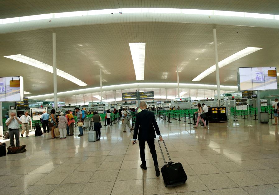 A man goes to security area at Terminal 1 of Barcelona-El Prat airport in Barcelona, Spain June 13, 2017. 