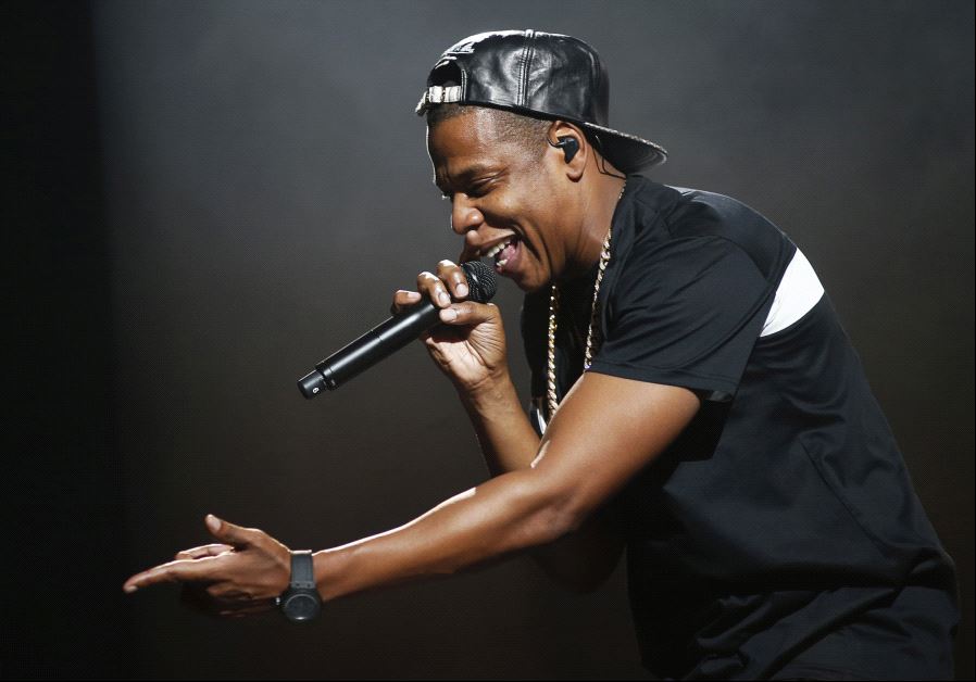 American rapper Jay-Z performs at Bercy stadium in Paris, October 17, 2013.