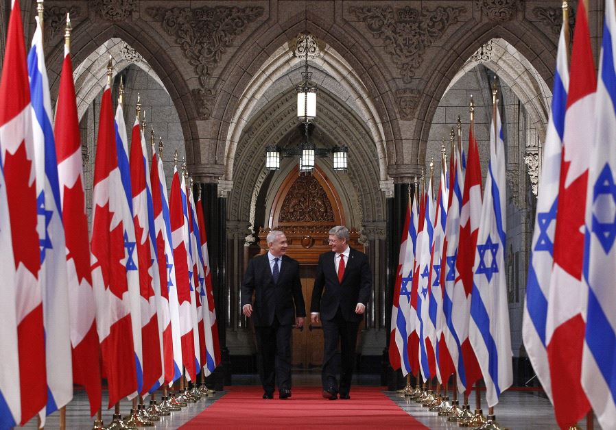 Canada's Prime Minister Stephen Harper (R) walks down the Hall of Honour with Israel's Prime Minister Benjamin Netanyahu on Parliament Hill in Ottawa March 2, 2012. 