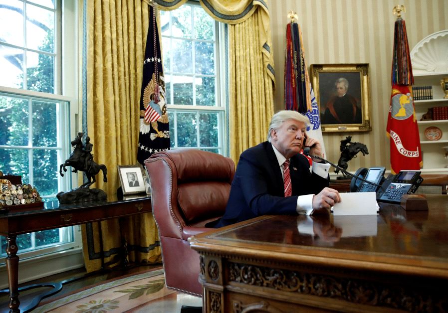 US President Donald Trump during a phone call at the Oval Office of the White House in Washington, U.S., June 27, 2017.