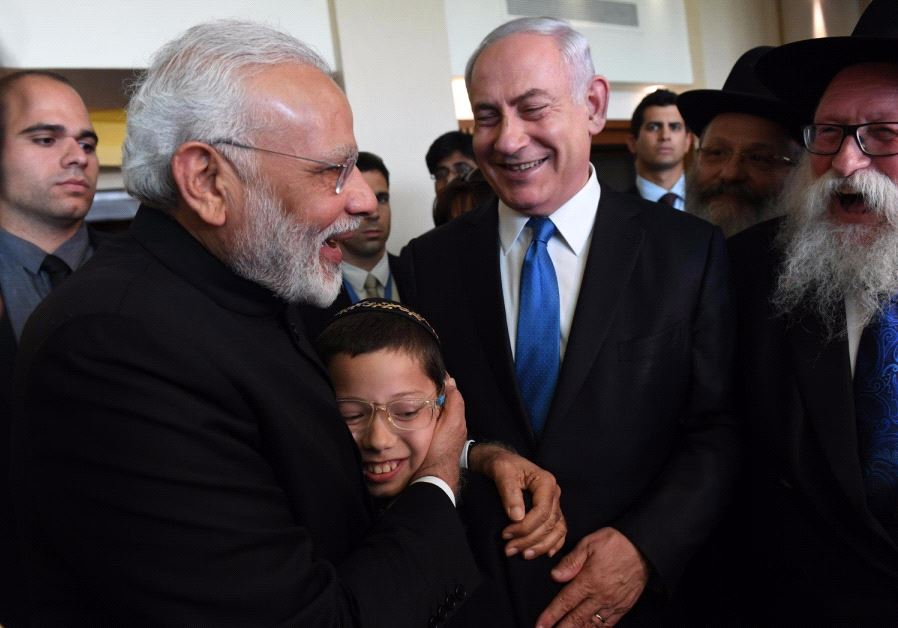 Visiting Indian Prime Minister Narendra Modi with Israeli youth Moshe Holtzberg 5th July 2017.
