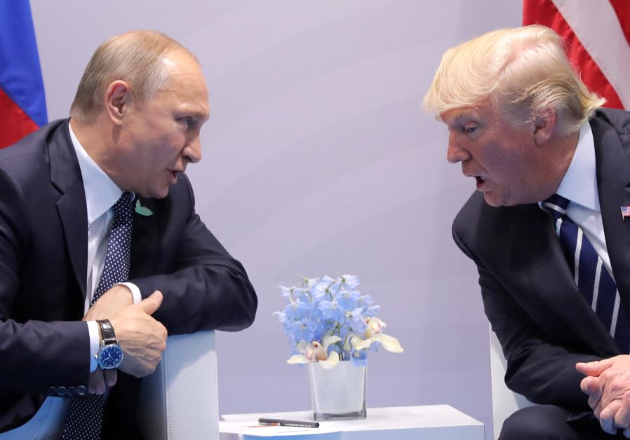 U.S. President Donald Trump speaks with Russian President Vladimir Putin during the their bilateral meeting at the G20 summit in Hamburg, Germany July 7, 2017.