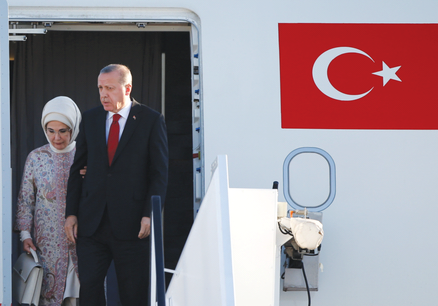 TURKISH PRESIDENT Recep Tayyip Erdogan and his wife, Emine, arrive for the G-20 leaders summit in Hamburg, Germany.