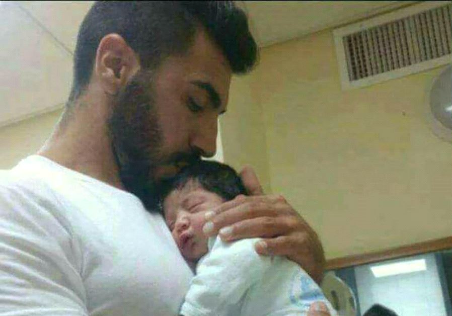 Slain police officer Hail Stawi and child