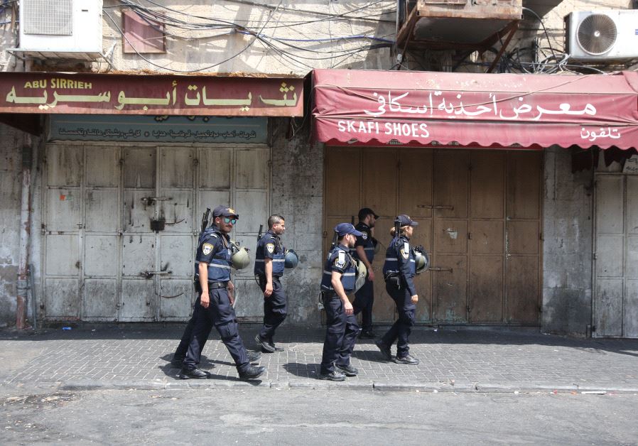 Police patrol Sultan Sulivan Road, Jerusalem, as security forces brace for disorder, July 21, 2017.