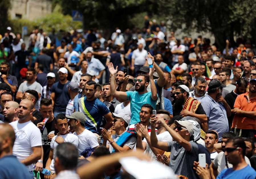 Palestinians shout slogans as they protest outside Jerusalem's Old city July 21, 2017.
