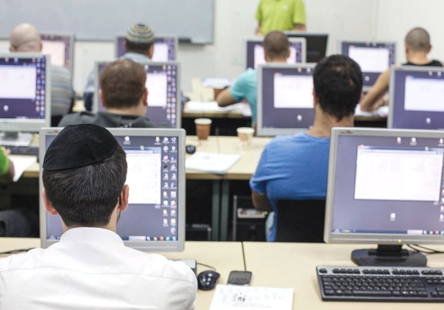 STUDENTS ATTEND a computer course at a technical college in Jerusalem