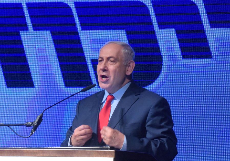 Prime Minister Benjamin Netanyahu speaks at a rally.